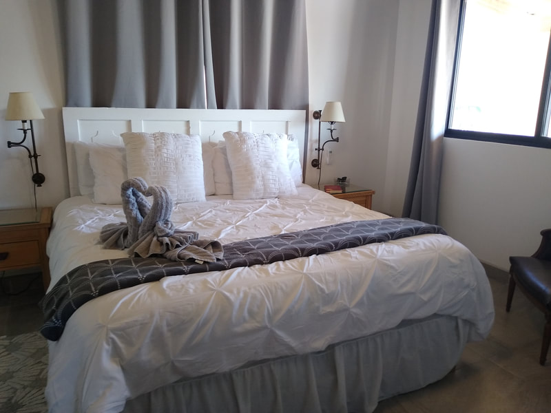 Bedroom with white linens