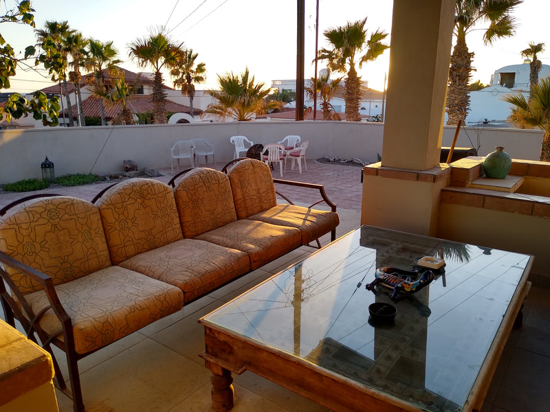 Covered patio lounge at golden hour